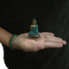 Mini Bouddha assis main levée