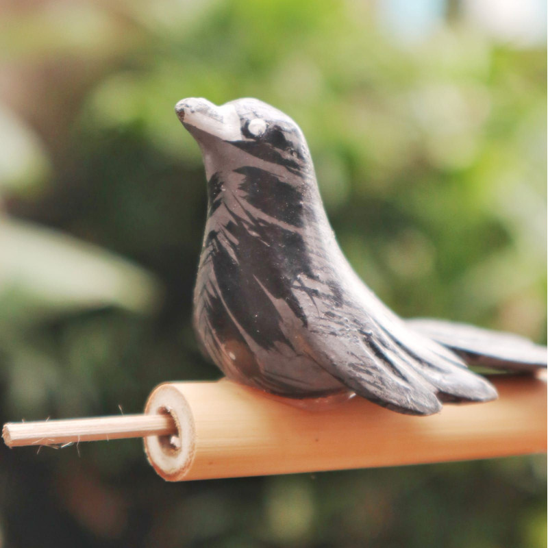 Sifflet à oiseaux en bois