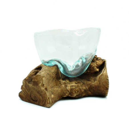 Bol en verre fondu aux formes étranges sur bois