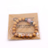 Bracelet chakra du cœur en bois de cèdre avec quartz rose