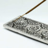 Porte-encens long Chakra en aluminium poli 23 cm