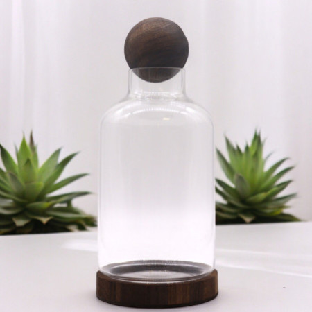 Grand terrarium en boule sur bois de tung foncé - 16 x 32 cm