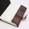 Livre noir et beige - Décor mauvais œil - 160 pages à bords frangés - 17 x 12,5 cm