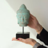 Tête de Bouddha immobile sur support - Cuivre vert