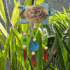 Sculpture de tortue aquatique et goutte de Copis