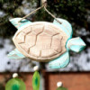 Sculpture de tortue aquatique et goutte de Copis