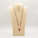 Collier cordon avec pendentif en pierre précieuse - Cornaline visage de soleil