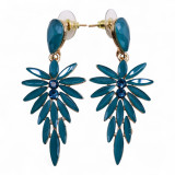 Boucles d'oreilles pendantes en verre vintage vert turquoise.