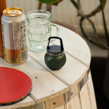 Mini-enceinte verte avec crochet de camping