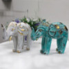 Éléphant sculpté en bois - Turquoise Gold
