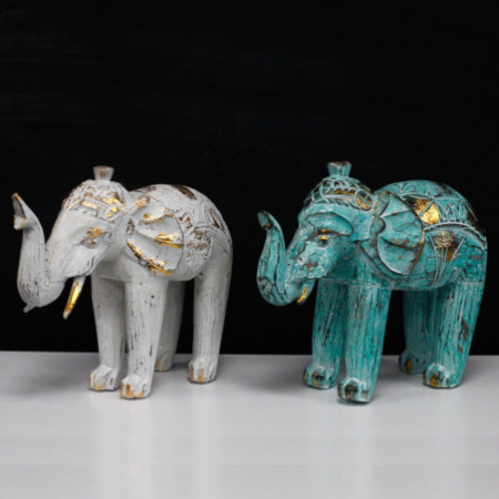 Éléphant sculpté en bois - Or blanc