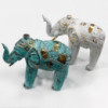Éléphant sculpté en bois - Or blanc