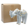 Éléphant sculpté en bois - Or blanc